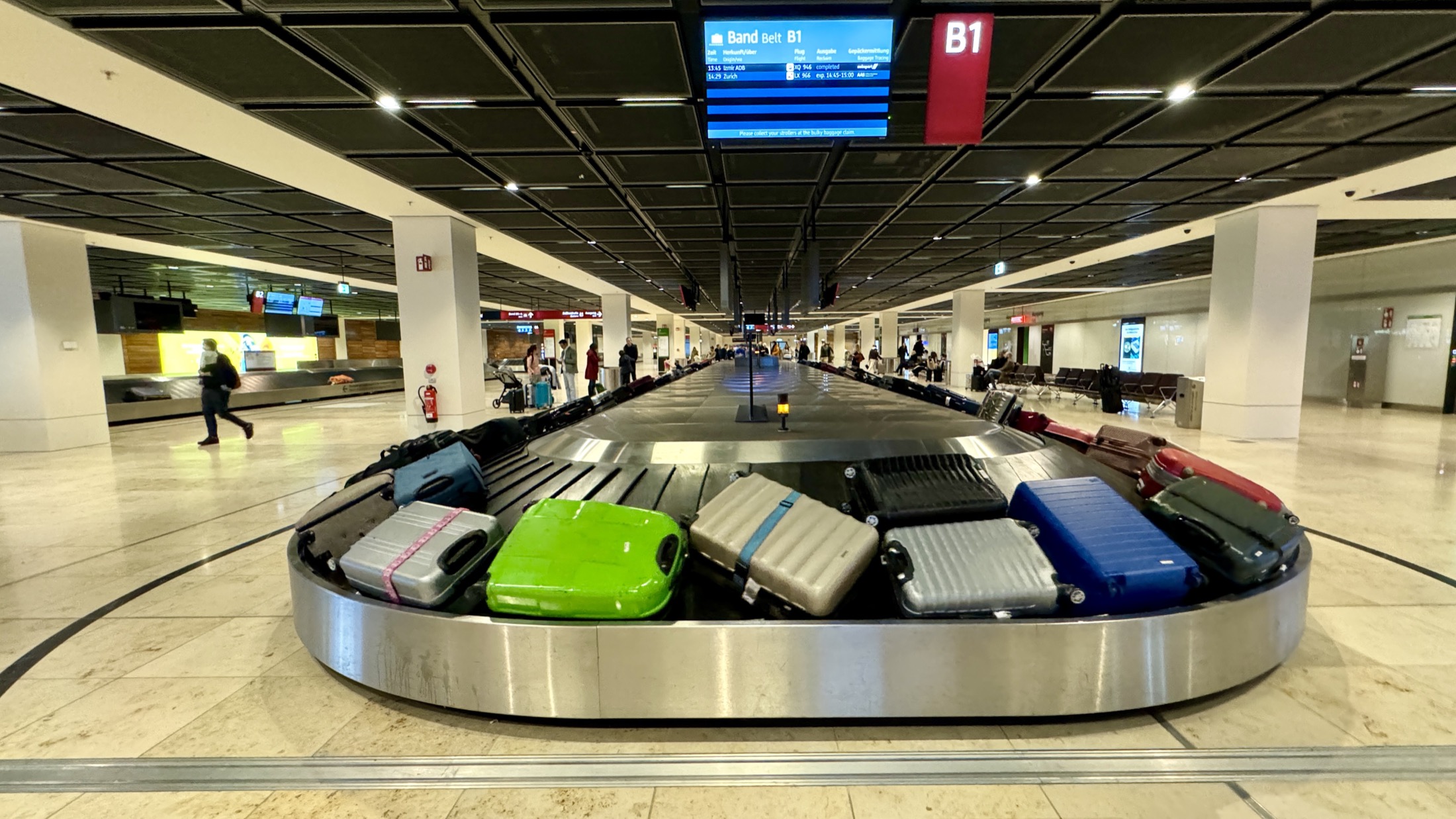 Baggage carousel with luggage